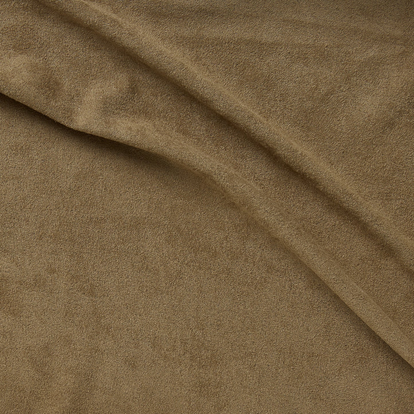 Showing super suede a tan colored soft stretrch polyester vegan suede with spandex featuring good drape