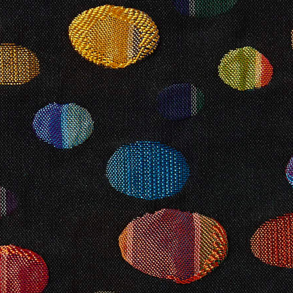 faberge showing a 3D jacquard multi colored spots closeup of embroidery on pure polyester closeup