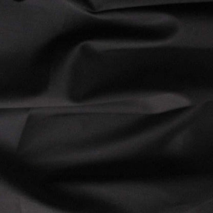 Displaying Sateen Cotton and Spandex a black colored Stretch Sateen with moderate drape Folds