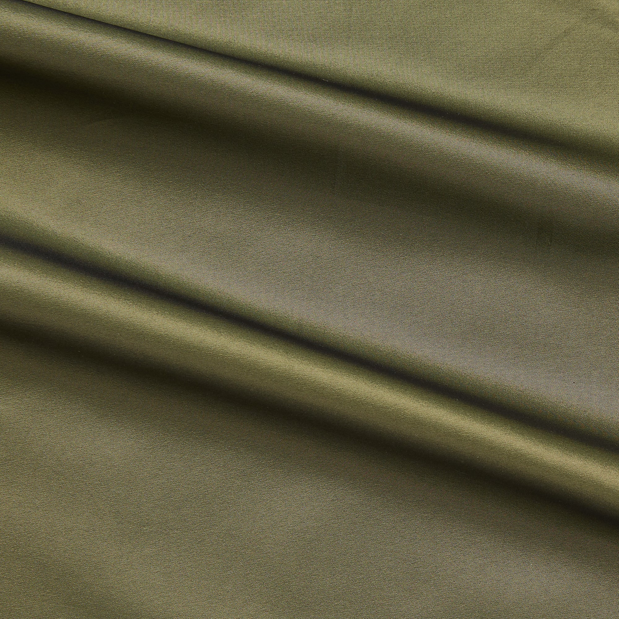 Tatler displaying the Olive color version of a pure Polyester crisp smooth and lightweight shot taffeta with lustre