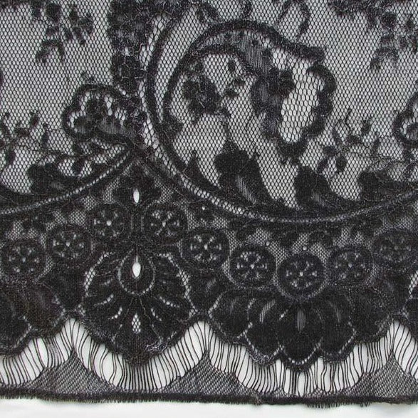 Featuring Tivoli Metallic antique Drop Panel Lace edge on a nylon, rayon and cotton blend with metallic print