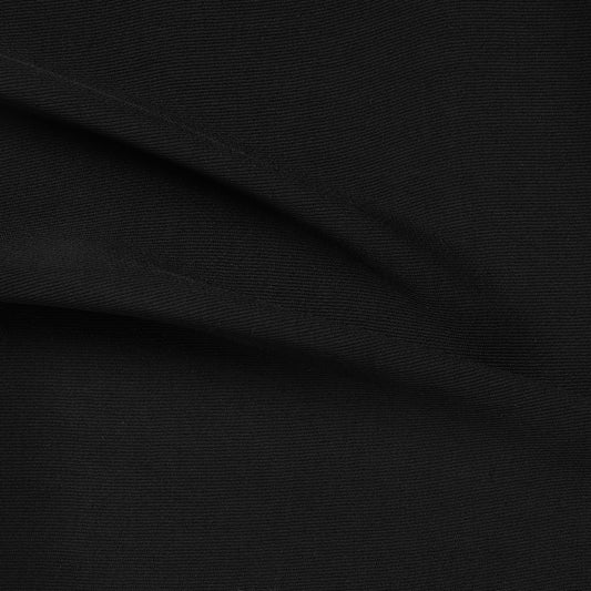 Featuring ultima a black color version of a polyester and acetate blend semi sheer mid weight textured fabric with fluid drape