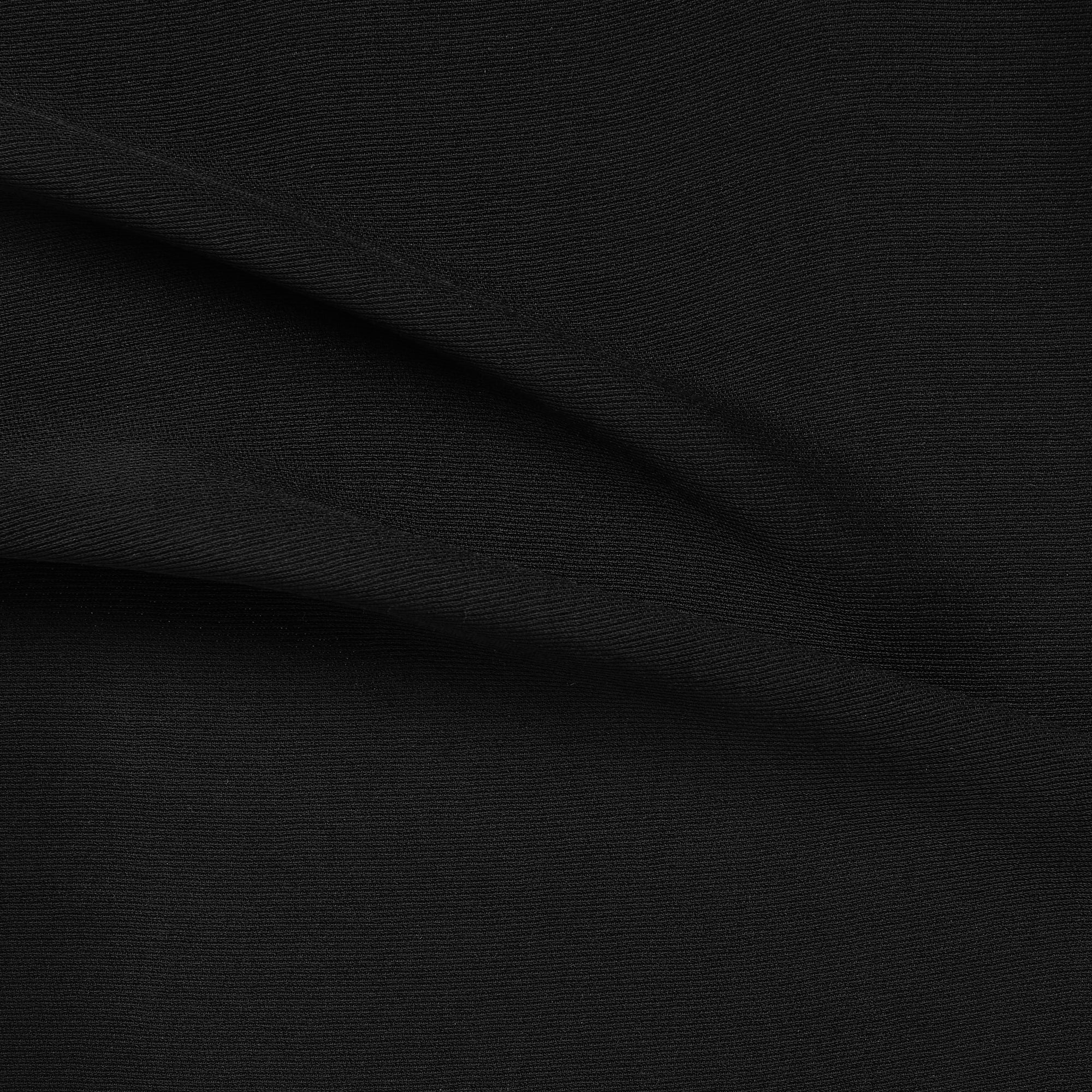 Dissplaying ultima a black color version of a polyester and acetate blend semi sheer mid weight textured fabric with fluid drape