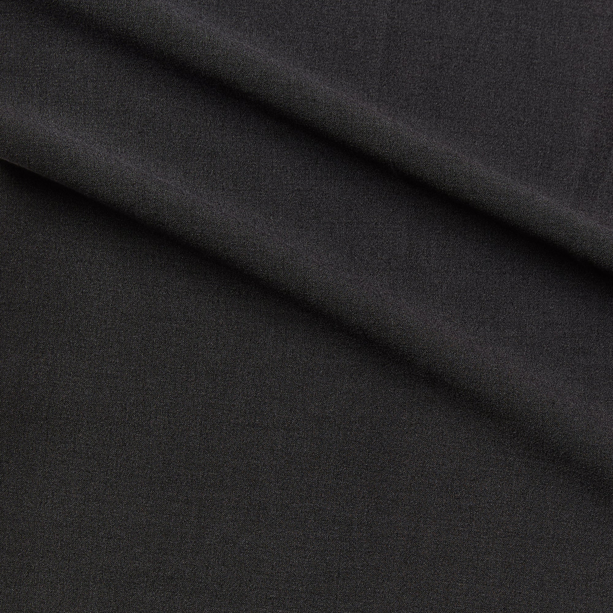 zara plain displaying the charcoal color version of a two-way stretch soft polyester and rayon with added spandex